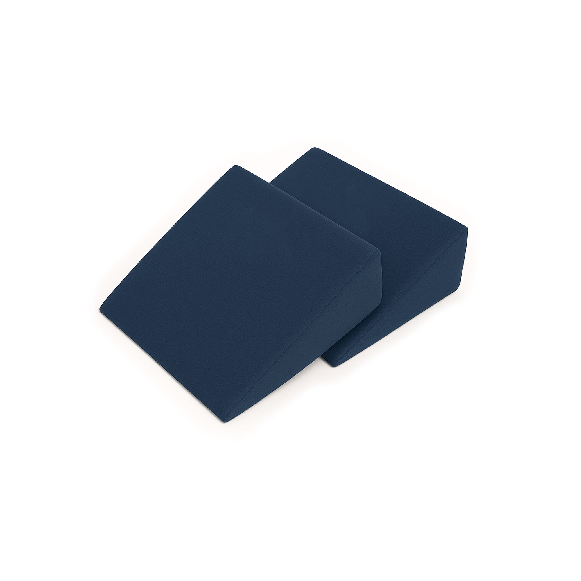 MRI-compatible wedge positioner made of viscoelastic memory foam with fluid-resistant fabric, featuring a stable square base and 3-inch height for patient comfort and support during MRI procedures.